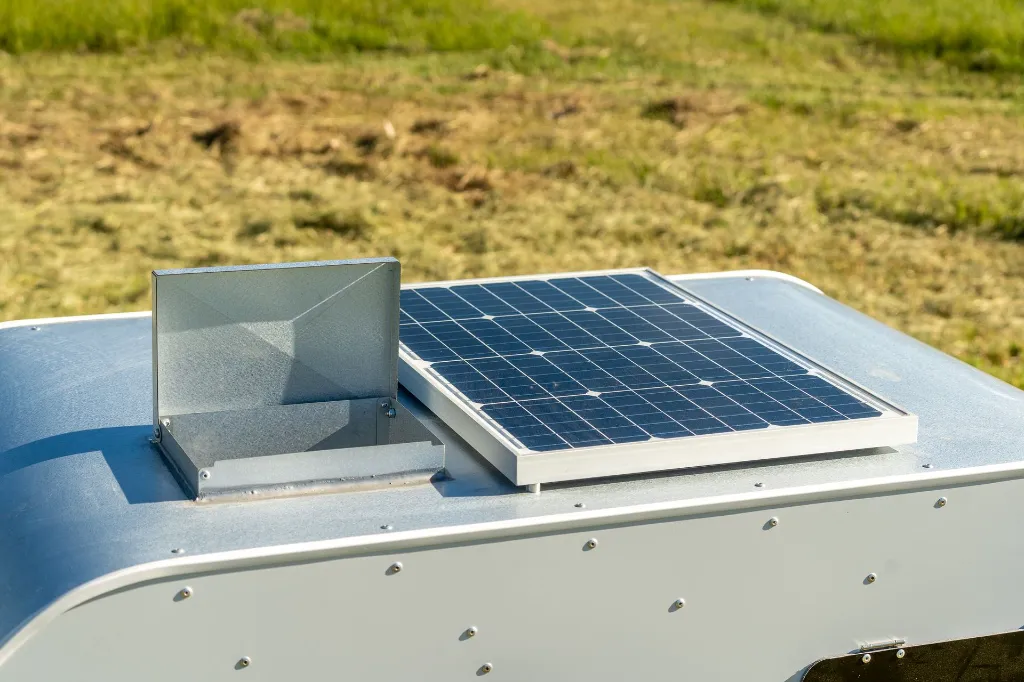 Chicken-Caravan-10-solar-panel-feeder-fill-point-open